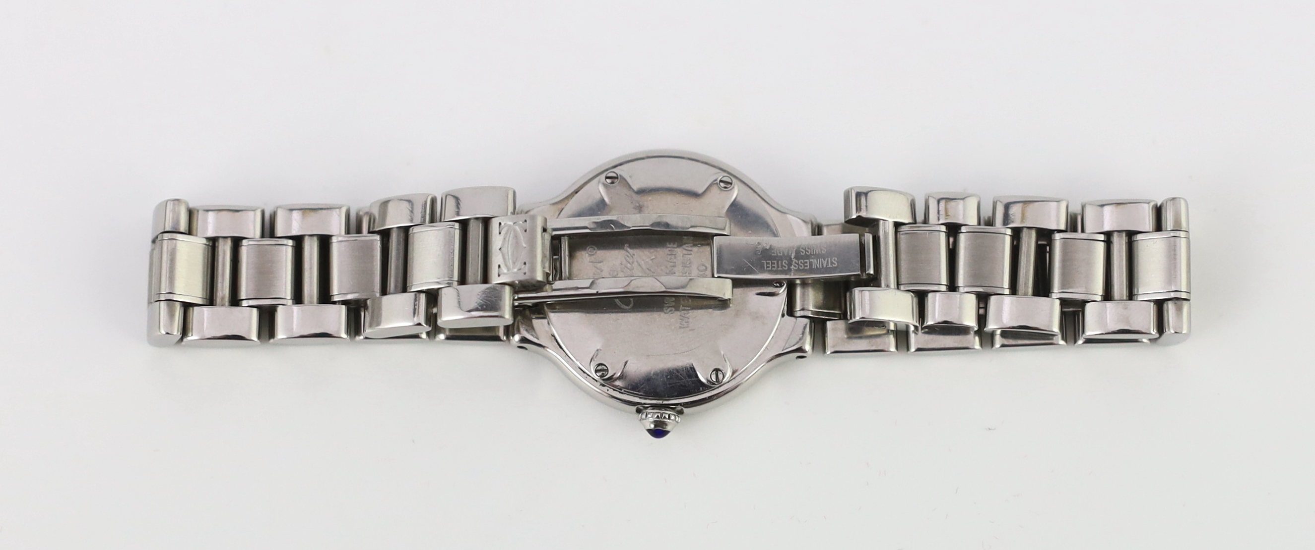 A lady's modern stainless steel Must de Cartier 21 quartz wrist watch, on a stainless steel Cartier bracelet